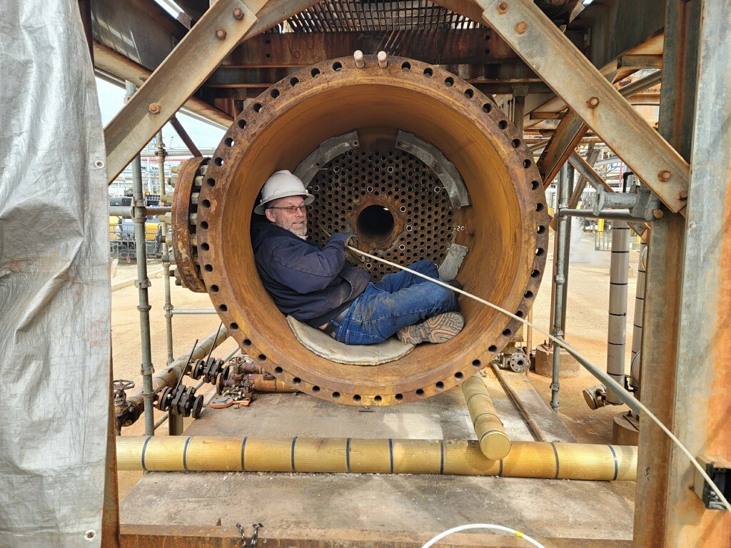 Tom Stokke Performing Eddy Current Inspection On Heat Exchanger.